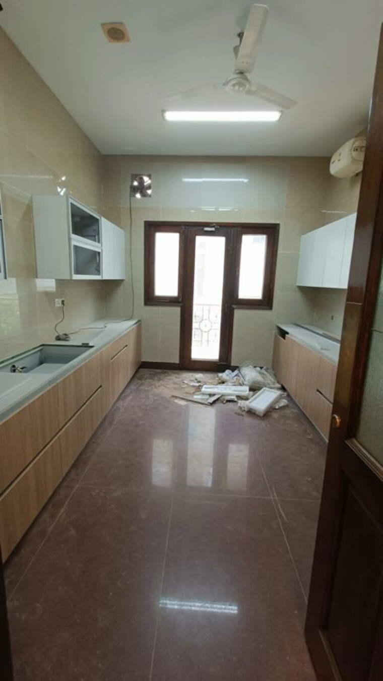 Kitchen, panchsheel park 5 Bedroom 800 Sq.Yd. Builder Floor In Panchsheel Park Delhi 10344990
