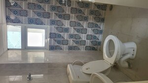 Bathroom in 2 BHK Apartment at Signature The Millennia 3, Sector 37d – for Rent