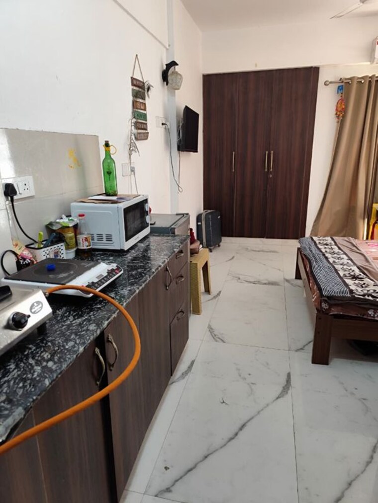 Kitchen, gaur-runway-suites Studio 550 Sq.Ft. Apartment In Gaur Yamuna City Greater Noida 10345087