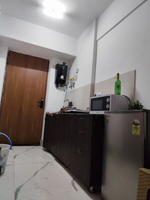 Kitchen in Studio Apartment at Gaur Runway Suites, Gaur Yamuna City – for Rent