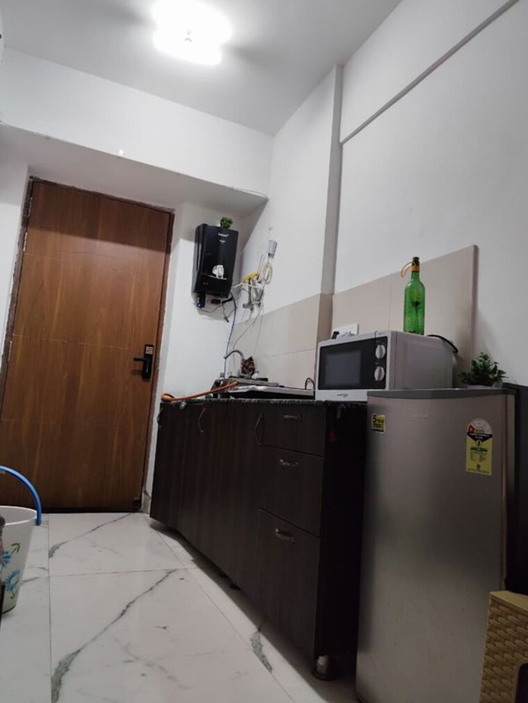 Kitchen, gaur-runway-suites Studio 550 Sq.Ft. Apartment In Gaur Yamuna City Greater Noida 10345087