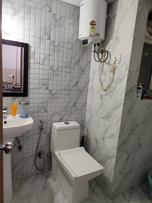 Bathroom in Studio Apartment at Gaur Runway Suites, Gaur Yamuna City – for Rent