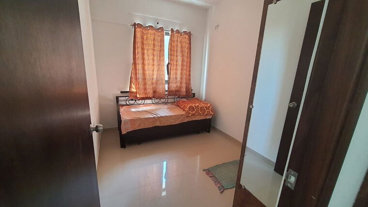 Living Room, shapoorji-pallonji-joyville-hinjewadi 2 Bedroom 700 Sq.Ft. Apartment In Hinjewadi Pune 10345125