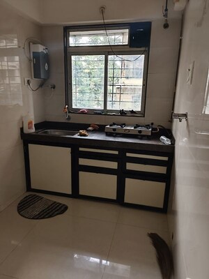 Kitchen in 1.5 BHK Apartment at Harsh CHS Tilak Nagar, Tilak Nagar – for Rent