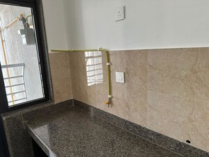 Kitchen in 3 BHK Apartment at Sunteck City Avenue 1, Goregaon West – for Rent
