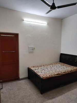 Bedroom in 2 BHK Builder Floor at Shalimar Bagh – for Rent