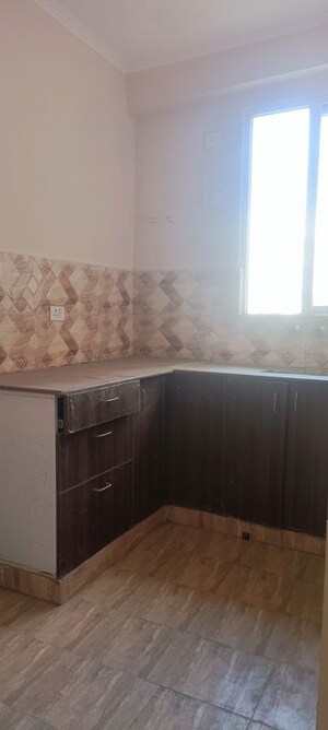 Kitchen in 3 BHK Apartment at Amrapali Dream Valley – for Sale