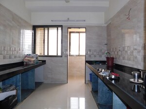 Kitchen in 3 BHK Apartment at Evershine Nagar – for Sale