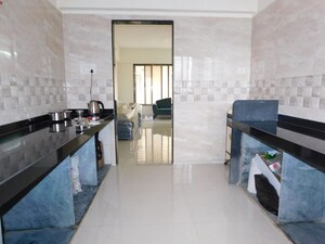 Kitchen in 3 BHK Apartment at Evershine Nagar – for Sale