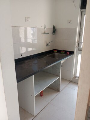 Kitchen in 1 BHK Apartment at Vijay Orovia, Ghodbunder Road – for Rent