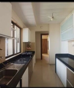 Kitchen in 2 BHK Apartment at Lodha Luxuria, Majiwada – for Sale