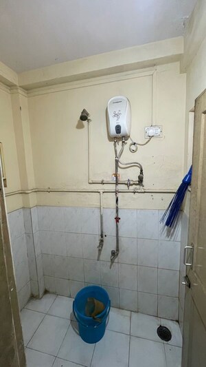 Bathroom in 1 BHK Apartment at Nisarg CHS Goregaon East, Goregaon East – for Rent
