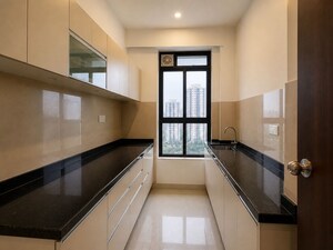 Kitchen in 2 BHK Apartment at Lodha Crown Quality Homes, Majiwada – for Rent