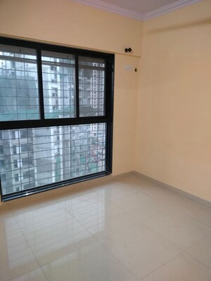 Room in 1 BHK Apartment at Raunak Delight, Owale – for Rent