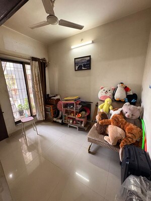 Living Room in 2.5 BHK Apartment at Everest World Tulip, Kolshet Road – for Sale