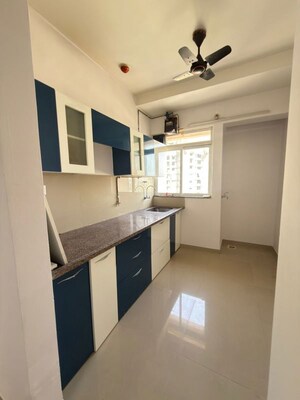 Kitchen in 1 BHK Apartment at Puranik Rumah Bali, Ghodbunder Road – for Rent