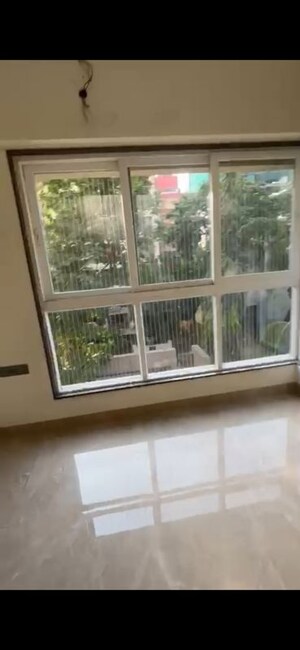 Bedroom in 3 BHK Apartment at Ashish CHS Chincholi Phatak, Malad West – for Rent