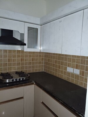 Kitchen in 2 BHK Apartment at Mahagun Mywoods, Sector 16c Greater Noida – for Rent