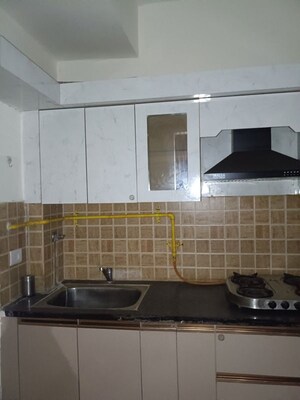 Kitchen in 2 BHK Apartment at Mahagun Mywoods, Sector 16c Greater Noida – for Rent