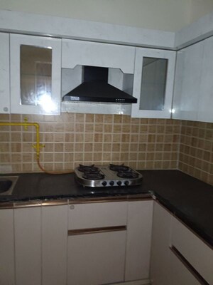 Kitchen in 2 BHK Apartment at Mahagun Mywoods, Sector 16c Greater Noida – for Rent