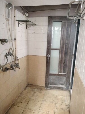 Bathroom in 1 BHK Apartment at Anu Nagar CHS, Vijay Nagari – for Rent