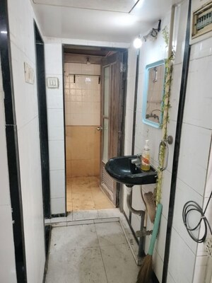 Bathroom in 1 BHK Apartment at Anu Nagar CHS, Vijay Nagari – for Rent