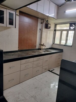 Kitchen in 1 BHK Apartment at Anu Nagar CHS, Vijay Nagari – for Rent