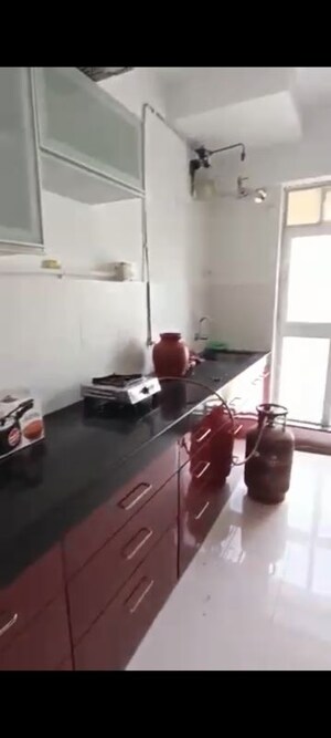 Kitchen in 3 BHK Apartment at Godrej Emerald, Ghodbunder Road – for Rent