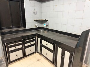 Kitchen in 2 BHK Apartment at Sandhyarag CHS, Kalyan West – for Sale