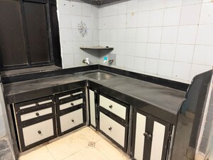 Kitchen in 2 BHK Apartment at Sandhyarag CHS, Kalyan West – for Sale
