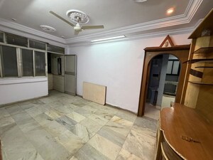 Living Room in 2 BHK Apartment at Sandhyarag CHS, Kalyan West – for Sale