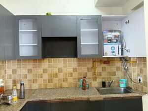 Kitchen in 2 BHK Apartment at Mahagun My Woods, Sector 16c Greater Noida – for Rent