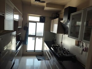 Kitchen in 2 BHK Apartment at Godrej Emerald, Ghodbunder Road – for Rent
