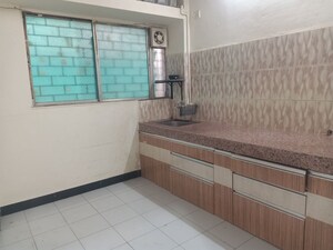Kitchen in 2 BHK Apartment at Adarsh Colony – for Rent
