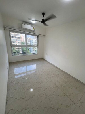 Room in 2 BHK Apartment at JP Eminence, Andheri West – for Rent