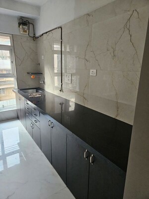 Kitchen in 3 BHK Apartment at Ekta Eminente Phase II, Khar West – for Rent