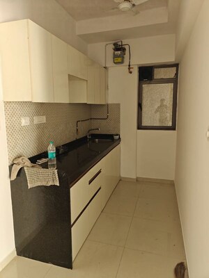 Kitchen in 1 BHK Apartment at Lodha Unica, Jogeshwari West – for Rent