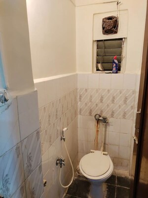 Bathroom in 2 BHK Apartment at Gundecha Builders Marigold, Kandivali East – for Rent