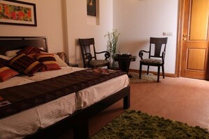 Bedroom in 4 BHK Builder Floor at Greater Kailash I – for Rent