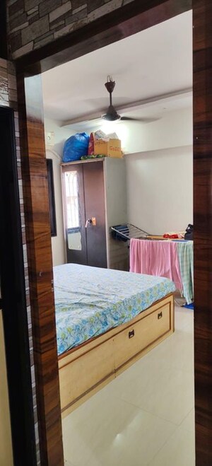Bedroom in 2 BHK Apartment at Dheeraj Enclave, Borivali East – for Rent