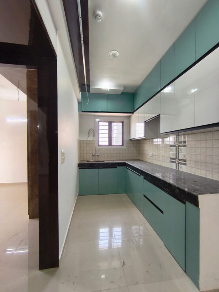 Kitchen, pareena-om-apartments 2 Bedroom 702 Sq.Ft. Apartment In Sector 112 Gurgaon 10345948