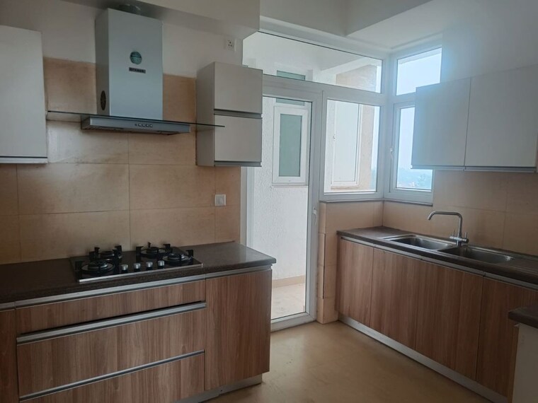Kitchen, puri-diplomatic-residences 3 Bedroom 1750 Sq.Ft. Apartment In Sector 111 Gurgaon 10345974