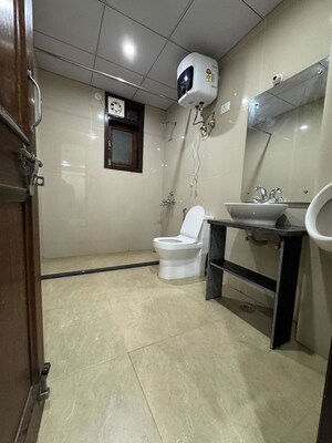 Bathroom in 2 BHK Builder Floor at Chattarpur – for Rent