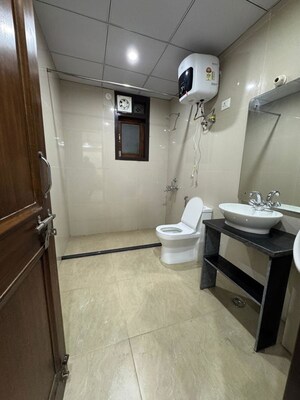 Bathroom in 2 BHK Builder Floor at Chattarpur – for Rent