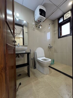 Bathroom in 2 BHK Builder Floor at Chattarpur – for Rent
