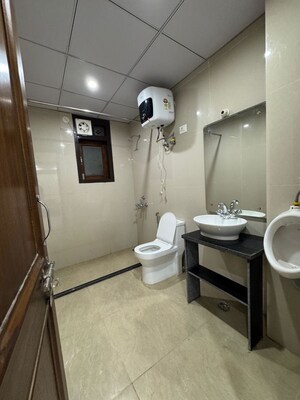 Bathroom in 2 BHK Builder Floor at Chattarpur – for Rent