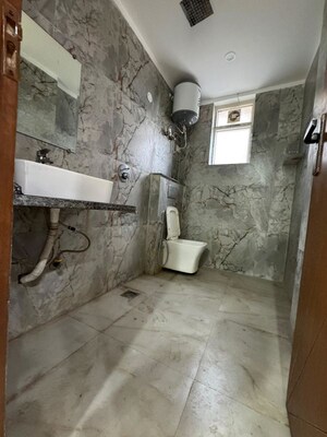 Bathroom in 3 BHK Apartment at Chattarpur – for Rent