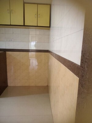 Kitchen in 2 BHK Apartment at Rustomjee Riviera, Malad West – for Rent