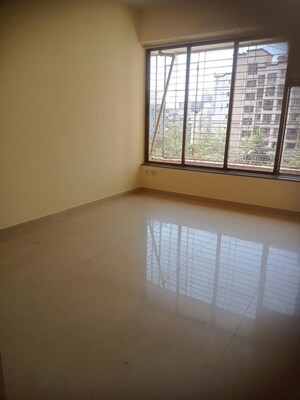 Room in 2 BHK Apartment at Rustomjee Riviera, Malad West – for Rent