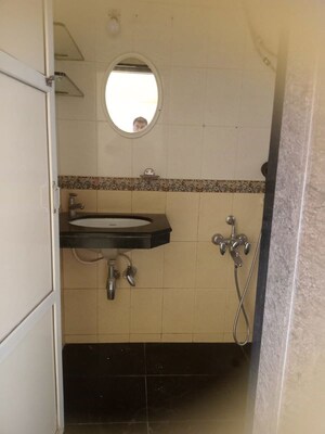 Bathroom in 2 BHK Apartment at Rustomjee Riviera, Malad West – for Rent